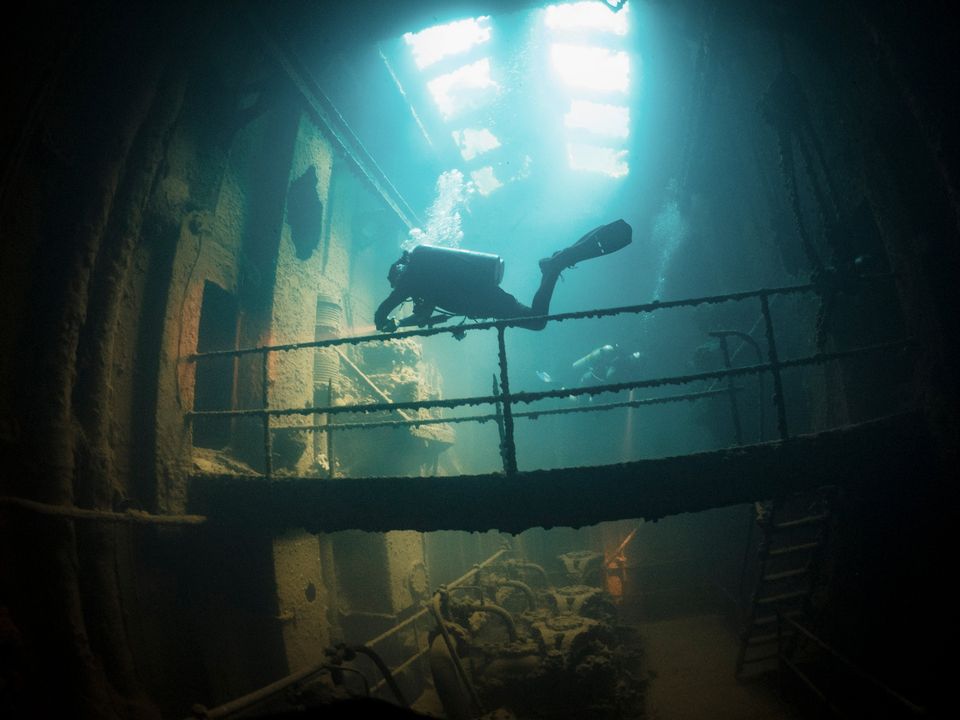 Diver on a catwalk, Chuuk Lagoon